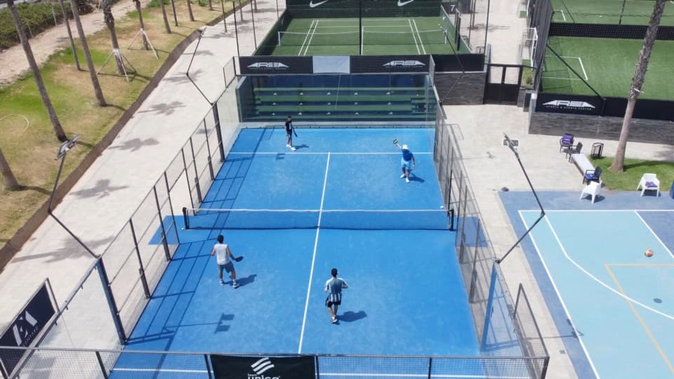 Padel match playing on the featured court